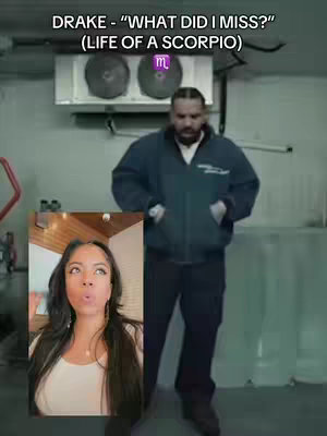 The cover image features a split-screen layout against a muted industrial backdrop. On the right, Drake stands confidently, dressed in a dark blue jacket and pants. In the dynamic inset at the bottom left, a woman with long hair is shown. The overlay text in the upper section spells out the title.