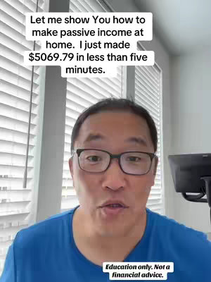A man with glasses is filmed from the chest up, speaking directly to the camera with a neutral expression. Above his head is overlaid text on a white background. The background displays white blinds.
