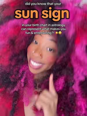 The cover image features a smiling woman with long, curly hair in shades of pink and black, pointing one finger up. Text overlays are present, set against a blurred background.