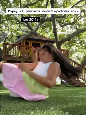The cover image shows a woman rolling on the grass. She wears a white top and pink and green pants. There's a treehouse visible in the background, and the setting appears to be a backyard with a tree overhead.