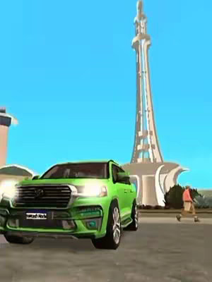 The cover image features a green car prominent in the foreground, with a tall, slender monument in the background under a bright blue sky. A person is walking on a sidewalk.