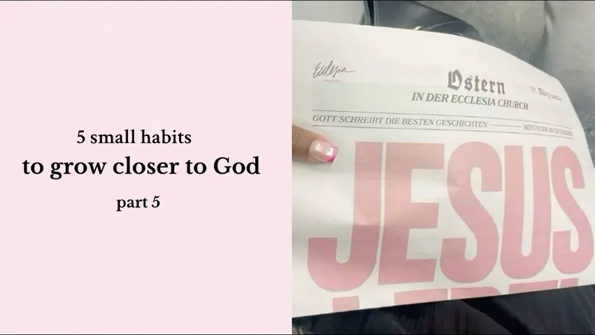 A pink-tinted image with a hand holding a piece of paper with the word JESUS in large, pink letters. Text overlays include "5 small habits to grow closer to God part 5" in a white font, against a pink backdrop on the left side. The hand is of a person with light pink nail polish, and a part of the text seems to be in another language (German).