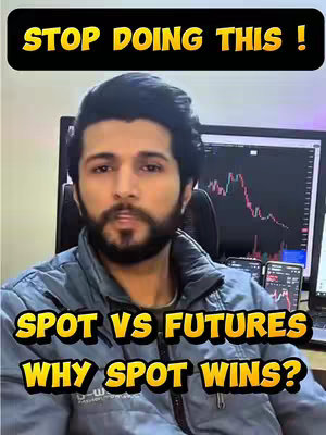 A man sits in front of a desk with screens showing graphs and trading data. Bold yellow text overlays read "STOP DOING THIS!" and "SPOT VS FUTURES WHY SPOT WINS?"