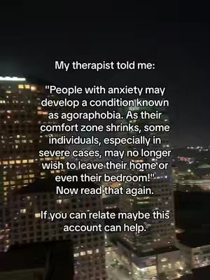 Text overlayed on a blurred background of city buildings at night. The text is white and contains a quote about anxiety and agoraphobia, with the prompt to 'read that again' and an invitation to seek help from the account.