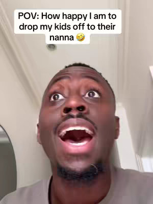 A close-up shot of a Black man with his head tilted upwards, looking surprised and excited. His mouth is wide open, and his eyes are looking up, with text overlayed. The background includes a white door frame or wall.