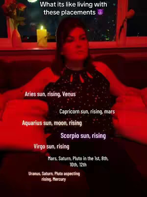 A woman sits inside with a red-tinted lighting. Text overlays include astrological terms about sun, moon, and rising signs.