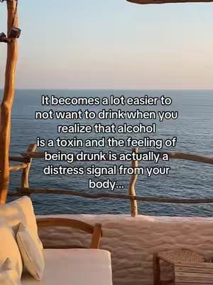 The cover image shows a scenic view of the ocean with a wooden structure in the foreground. The focus is on a message overlay: It becomes a lot easier to not want to drink when you realize that alcohol is a toxin and feeling of being drunk is actually a distress signal from your body... The color palette features natural tones, indicating a serene outdoor setting with text on the background.
