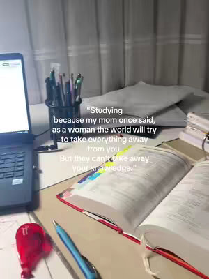 A desk with a laptop open, books, pens, and a red marker. The text overlayed uses a quote about knowledge and studying.