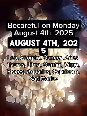 The image features a dark wooden surface with a scattering of peeled garlic cloves. Overlaid are three lines of white text with a bold black rectangle and a list of zodiac signs.