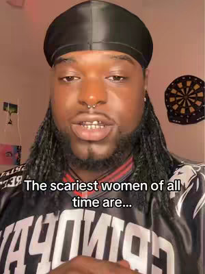 The cover image features a close-up shot of a Black man with long dreadlocks and a black durag. He is looking directly at the camera and speaking. The background isn't a focus, but there's a dartboard visible on the right side of the frame and a pinkish light. The man is wearing a shirt with visible text. Text overlay at the bottom reads, 'The scariest women of all time are…'.