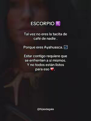 Image features an out-of-focus portrait in the background, with overlaid text in a stylish font. The text is centered and includes the word 'ESCORPIO'. The overall composition is dark and moody.