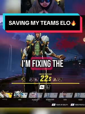 The cover image is a vertical screenshot from a mobile game. The top portion of the image is a blurred view of a person, likely the creator, with the lower part displaying in-game graphics with character illustrations, text overlays and a user interface.