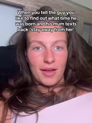 A selfie-style video cover. A woman with light skin and long, wavy brown hair filling most of the frame. The background appears to be a dimly lit indoor setting. The hook text is superimposed at the top.