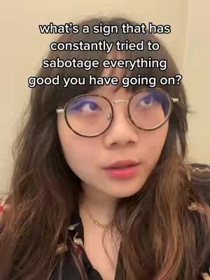 The cover image features a close-up of a person with long, wavy brown hair and glasses. Text overlayed over the person asks a question about Zodiac signs.