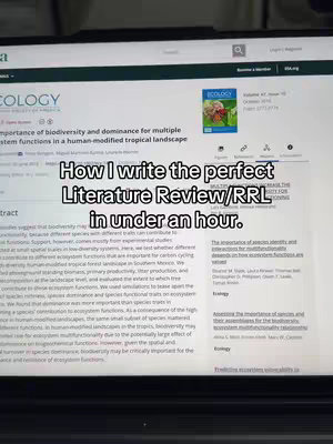 A person is filming a laptop screen. The screen displays a webpage with an academic journal article, with black text on white. A text overlay over the screen states, 'How I write the perfect Literature Review/RRL in under an hour.'. The background is a light-colored surface, and the top of the screen is visible, showing the laptop's frame.