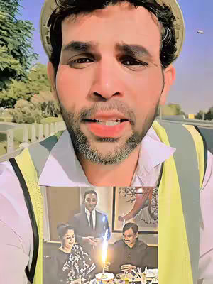 A man in a construction worker outfit takes a selfie with a smaller image visible over the center suggesting a party scene with people. The man is in the foreground, looking into the camera, with a blurred street scene in the background.