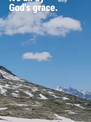 The image showcases a mountainous landscape under a bright blue sky with scattered white clouds. The foreground features a rocky, snow-dusted mountain, leading to a view of other snow-capped mountains in the distance. The sky takes up most of the frame and features some overlay text at the top.