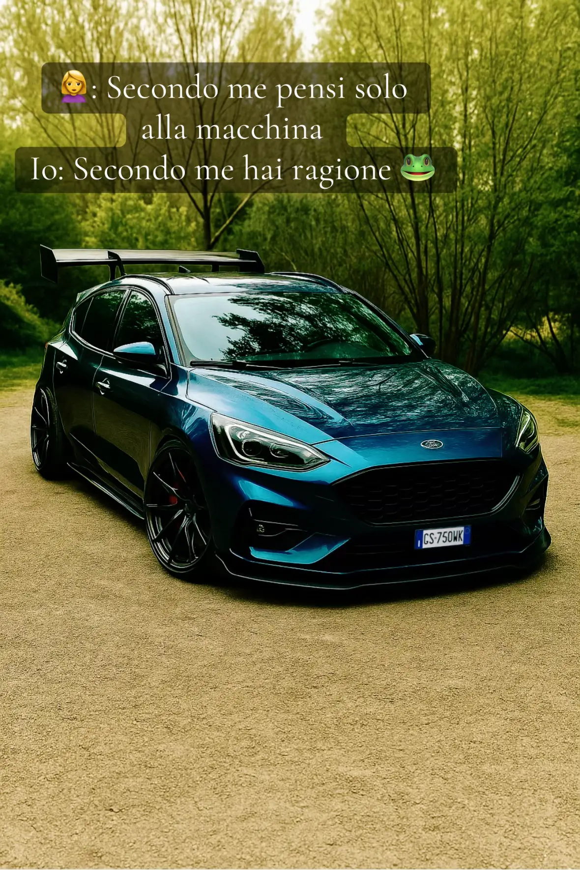 A stylish, tuned blue Ford Focus from a low angle, parked on a dirt road. It has darkened windows, black rims, and a large spoiler. Text overlays add conversation bubbles conveying dialogue about the car.