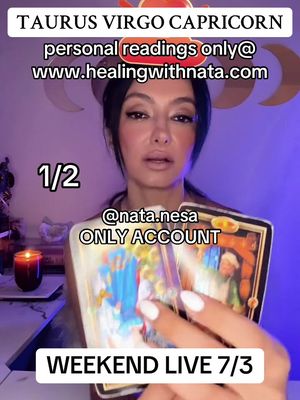 A woman with dark hair and makeup is holding up two tarot cards in a close-up shot, against a blurred background. Text overlays appear at the top, bottom, and center, including the zodiac signs Taurus, Virgo, and Capricorn.