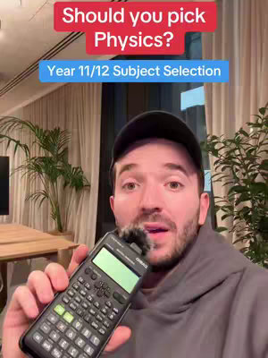 A man in a hoodie holds a calculator in front of his face, with overlay text at the top.