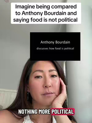A woman with long dark hair and a white top is angled slightly to the right, with a calm expression. A black box is superimposed with the text "Anthony Bourdain discusses how food is political." Below her, a red banner reads "NOTHING MORE POLITICAL." The setting appears to be indoors with a light-colored wall in the background.