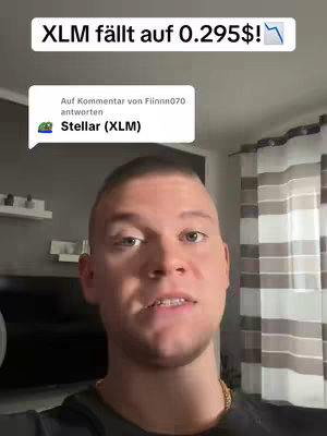 A man is in front of a camera, discussing XLM crypto prices.