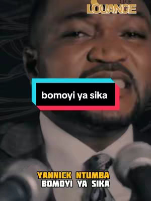 The cover image features a close-up of a man, likely the creator, singing or speaking into a microphone. Text overlays are present, with the central hook in a rectangular box in front of the creator. The overall composition suggests a music or performance context.