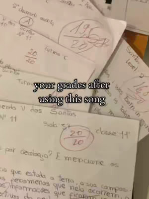 The image shows a stack of papers with what appear to be test grades, with handwritten annotations and circled scores. The papers are slightly crumpled. One piece is centered with the circled score, "20/20". Handwriting, red ink, and a sense of personal note-taking are key visual elements. There's overlaid text.
