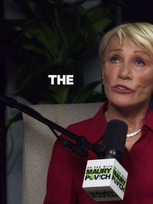 The cover image shows a woman in a red shirt speaking into a microphone. The woman has short blonde hair and a diamond necklace. A sign with "ON PAR WITH MAURY POVCH" is attached to the microphone. A hook, "THE," is overlaid in white text.
