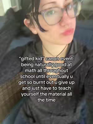 A selfie-style video cover with a person wearing glasses and a dark-colored hoodie. The background is blurred, suggesting an interior setting. The text overlay includes phrases relating to math and school.