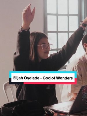 The cover image shows a person with raised arms, looking upwards. The person has glasses and short hair. The text overlay at the bottom says "Elijah Oyelade - God of Wonders."