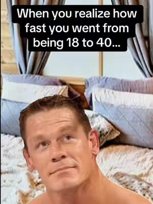 The image shows a meme featuring John Cena's face superimposed over a cozy bed setting with pillows and a window in the background. Text overlayed on the image reads, 'When you realize how fast you went from being 18 to 40...' conveying a humorous and relatable sentiment about aging.