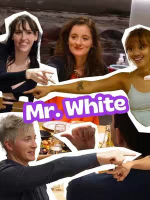 A cover image featuring multiple people, primarily three women, pointing towards each other or at a central point, likely a table setting. The background is slightly blurred, suggesting a meal or gathering setting. A large purple banner reading 'Mr. White' is overlaid on the image.