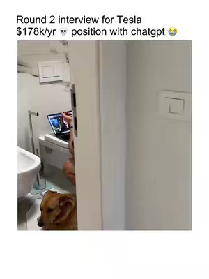 The cover image shows a person in a bathroom using a laptop, viewed through a partially open doorway creating a voyeuristic effect. A dog peers from the lower section of the door adding to the candid feel of the shot