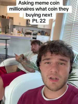 A selfie-style shot with the creator in the foreground, looking at the camera. Behind him, another person is seated and using a phone. The background shows a kitchen or living area with a blurred appearance. Text overlay in the top area provides context.