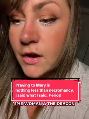 A close-up shot of a woman's face, likely addressing the camera. She has a mix of makeup, notably on her eyes and cheeks. A red rectangular banner is overlaid at the bottom with text, with the bottom banner having text as well.