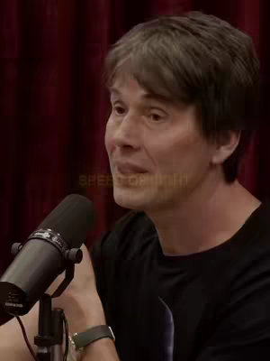 The cover image shows a man with graying hair, speaking into a microphone. He has a serious expression. A muted 'SPEED OF LIGHT' text overlay is visible. The background appears to be a dark red.