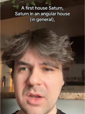 A close-up shot of a man with dark hair, the top of his head and upper face are framed by text overlay about Saturn in an angular house. The background has indistinct features, possibly a countertop and an area above a cabinet. The overall tone seems to be educational based on the text overlay.