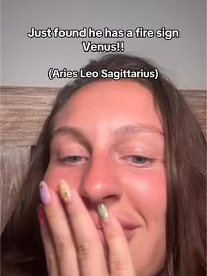 A close-up shot of a person's face with a hand covering the mouth on the right side, against a blurred background. The person displays a slight smile. Text overlays appear at the top, written in a bold, sans-serif font.