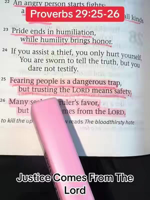 A page from a Bible with text highlighted, a pink highlighter pen at an angle, with text overlayed at the bottom of the image