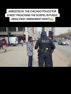 A street scene featuring a young Black man being approached and questioned by two police officers. Text overlay at the top announces the subject's arrest for preaching the gospel in a public area.