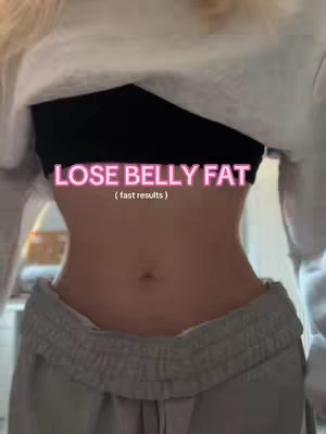 The cover image shows a close-up of a person's abdomen, focusing on their waist. The person is wearing a black sports bra and gray sweatpants. The overlay text states, ''LOSE BELLY FAT (fast results )'' which is in a pink, glowing font.