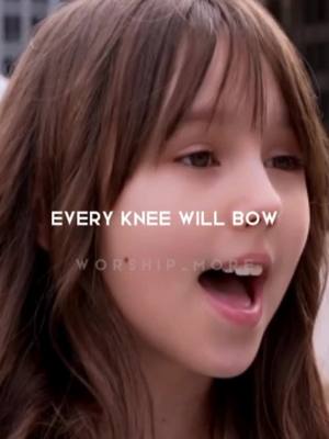 A close-up shot of a young girl looking upwards with her mouth open in song and the text overlayed onto the image.