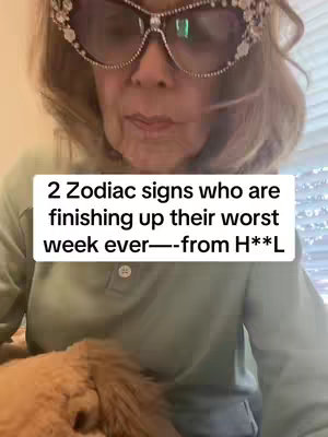 An older woman wearing large, decorated sunglasses is the central focus of the image. She is positioned from the chest up, with a light green top and a glimpse of what appears to be a fluffy pet in the bottom frame. Overlaid text indicates the content's focus on zodiac signs and astrological predictions.