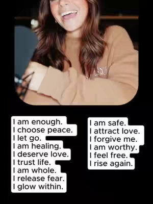A cover image features a smiling woman with flowing brown hair, centered in an oval frame against a black background. She is wearing a tan sweater. Below her, two columns of text with affirmations are displayed in white font on black rectangles.