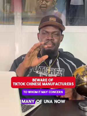 A man in a black shirt and brown cap speaks directly to the camera. Red and purple text overlays provide additional information. A globe is to his right.