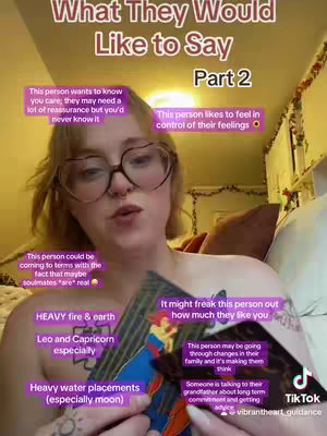 A woman is centered in the frame holding tarot cards, wearing heart-shaped glasses and looking towards the camera. Text overlays in various colored boxes with bullet points are positioned around her.