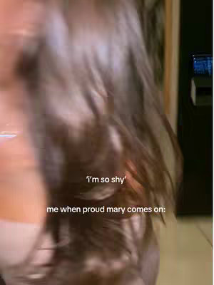 The cover image shows a blurred shot focusing on the back of a person’s head with long, brown hair. Text overlays are partially visible. The background is out of focus, but hints at an interior setting.