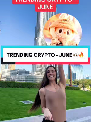 The cover image presents a bright outdoor scene with a woman in the foreground and a cityscape in the background. The woman, with long dark hair, is dressed in a light-colored top. Overlayed on the image is a teal and red rectangular bar displaying the text 'TRENDING CRYPTO - JUNE' and a circle holding a plush toy. The overall composition is energetic and informative.