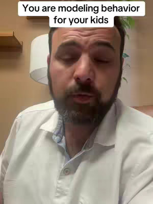 The cover image shows a man speaking directly to the camera; text overlays say, 'You are modeling behavior for your kids.' The man has a beard and is wearing a white shirt. The background includes a lamp and what appears to be a wall.